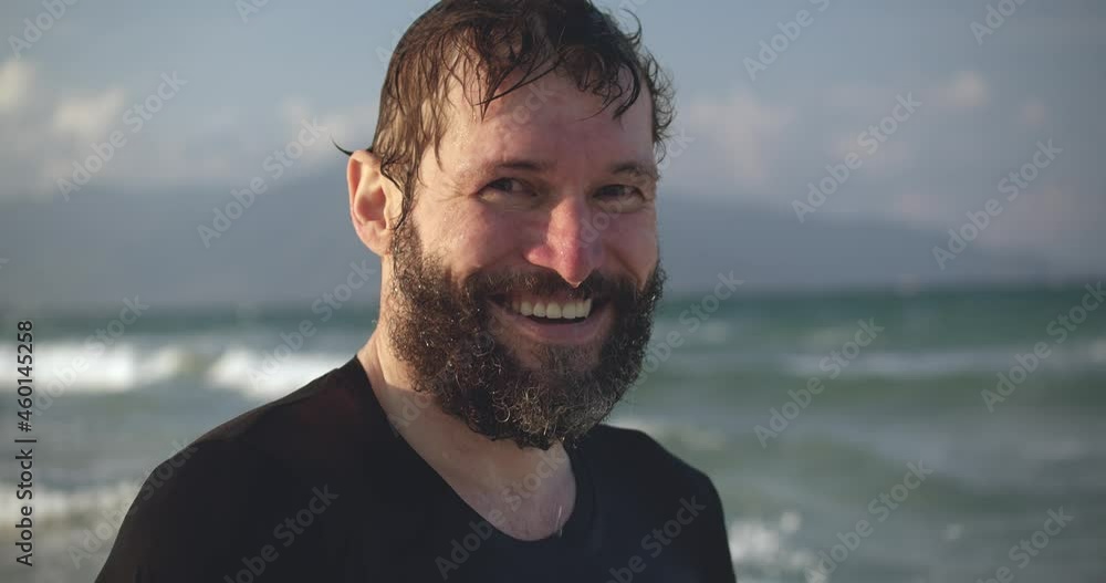 Portrait senior handsome man of sportsman at the age.Senior citizen with a surf. Portrait senior handsome man of sportsman at the age.Senior citizen with a surf.