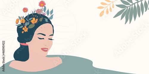Face of smiling relaxed woman taking care of her body. Treatment therapy cleaning care and hygiene of the body and female skin. Wellness center or beauty salon. Anti-aging treatment.SPA