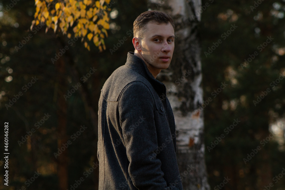 a man walking in the autumn forest a man walking in the autumn forest