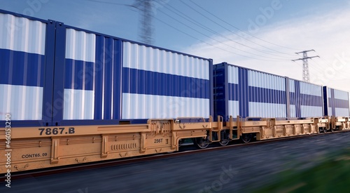 Finnish export. Running train loaded with containers with the flag of Finland. 