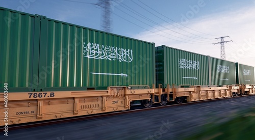 Saudi export. Running train loaded with containers with the flag of Saudi Arabia. 
