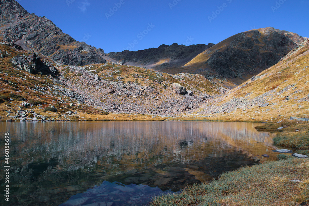 Reflection in the lake in the Pyrenees Reflection in the lake in the Pyrenees