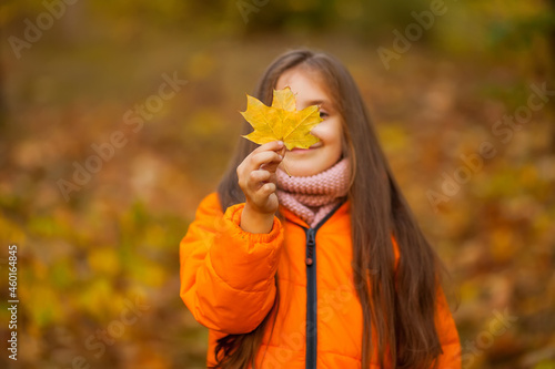 autumn outdoor portrait of beautiful happy child girl