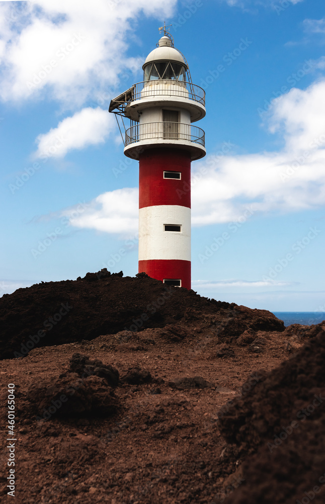 Beautiful red and white lighthouse at Punte de Teno, Tenerife, Canary Islands, Spain. 
