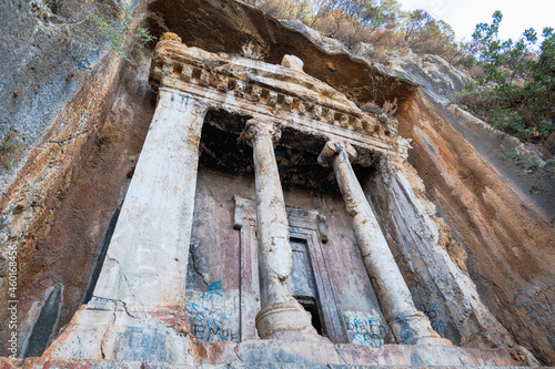 Tomb of Amyntas,  the Fethiye Tomb. View of the tombs carved into the rock from the time of the ancient state of Lycia. Amyntas ancient Lycian rock tombs in Pinara, Fethiye - Turkey photo