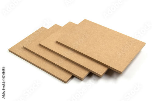 Wooden boards, brown-yellow in color, known as MDF.