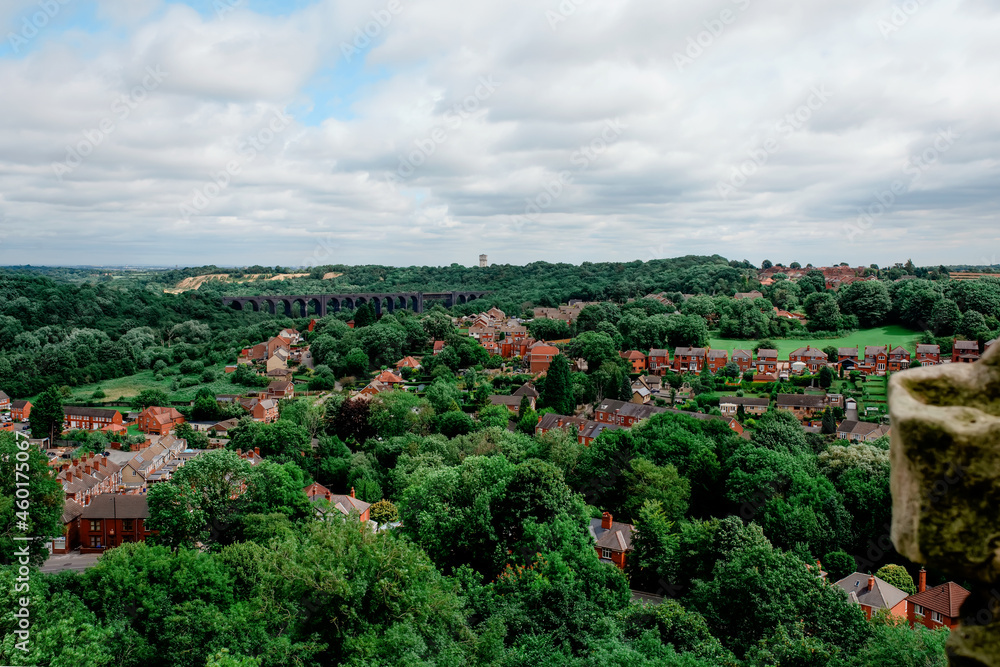 An ordinary English town among the trees on a summer day top view