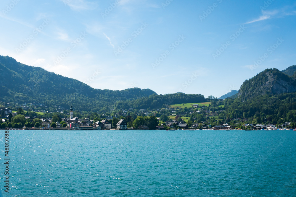 St. Gilgen at the Wolfgangsee in Salzkammergut region, Austria. View from the lake to the famous town and touristic destination.