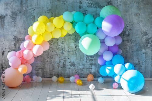 An arch of colored balloons on a holiday. Copy space for text
