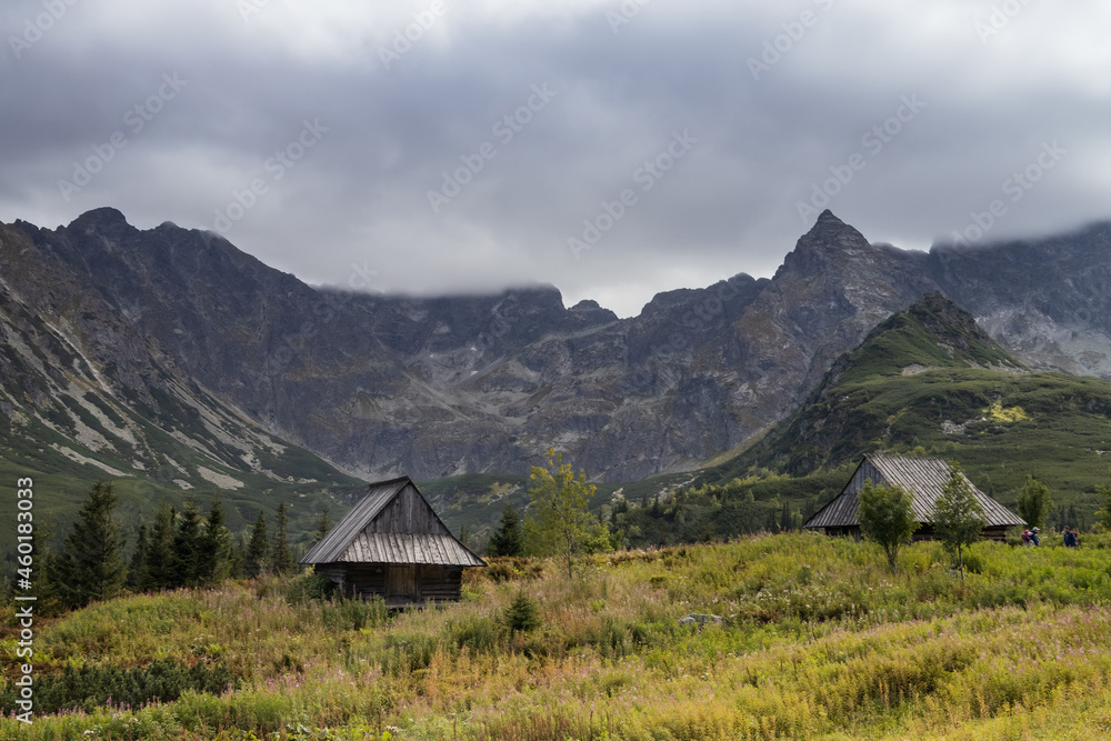Huts in mountain valley PL