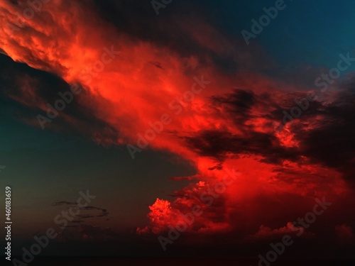 Fiery red clouds on the night sunset sky 