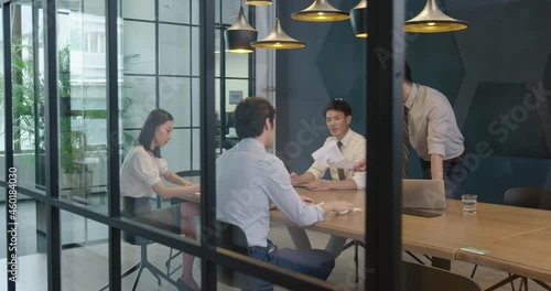 Successful Chinese business people having a meeting,4K