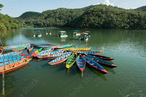 Colourful boats docked on Phewa lake, Pokhara, Nepal.