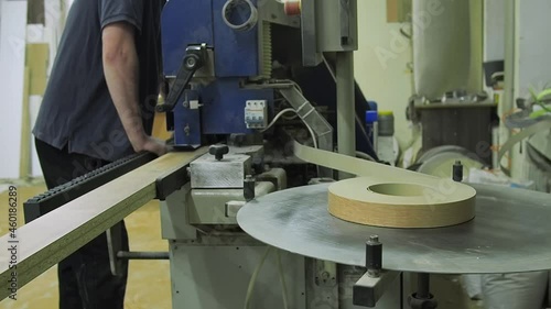 gluing process material for board chipboard edges. Plastic pre glued edge banding tape for furniture production decor and repair