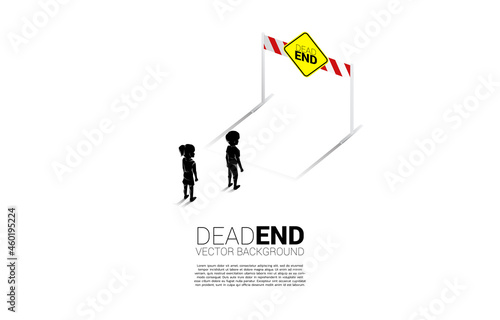 Silhouette boy and girl standing with dead end signage . Concept of no future for children.