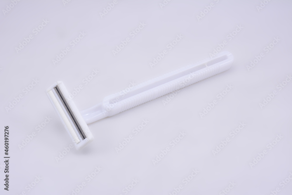 White plastic disposable razor facial hair shaver White plastic disposable razor facial hair shaver