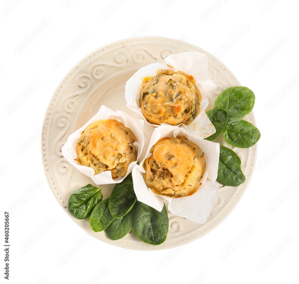 Plate with tasty spinach muffins on white background