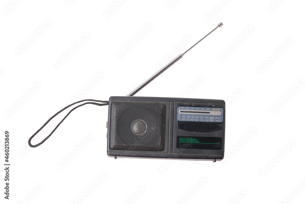 An old worn radio receiver with a decomposed antenna isolated on a white background. An old worn radio receiver with a decomposed antenna isolated on a white background.