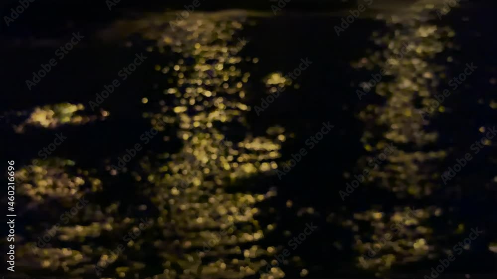 Blurred View Of Glittering Sea Water On A Dark Sunset. static defocused Blurred View Of Glittering Sea Water On A Dark Sunset. static defocused