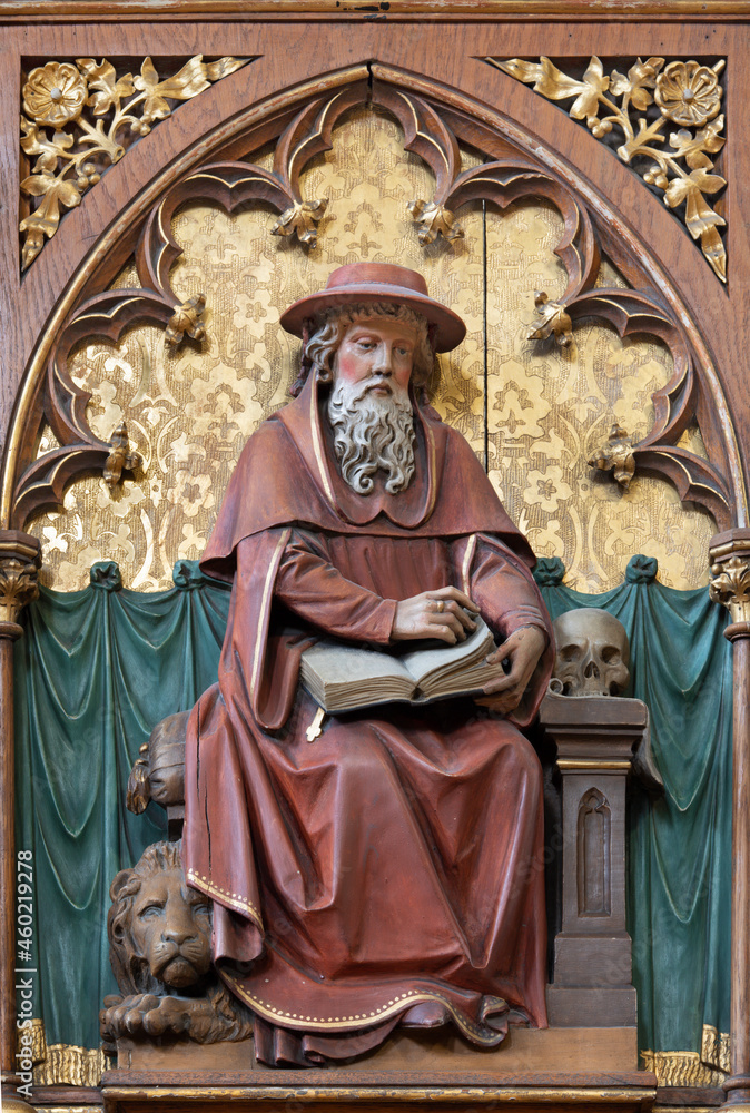 VIENNA, AUSTIRA - JUNI 24, 2021: The relief of St. Jerome the doctor of west church in the church Marienkirche by unknown artist from end of 19. cent.
