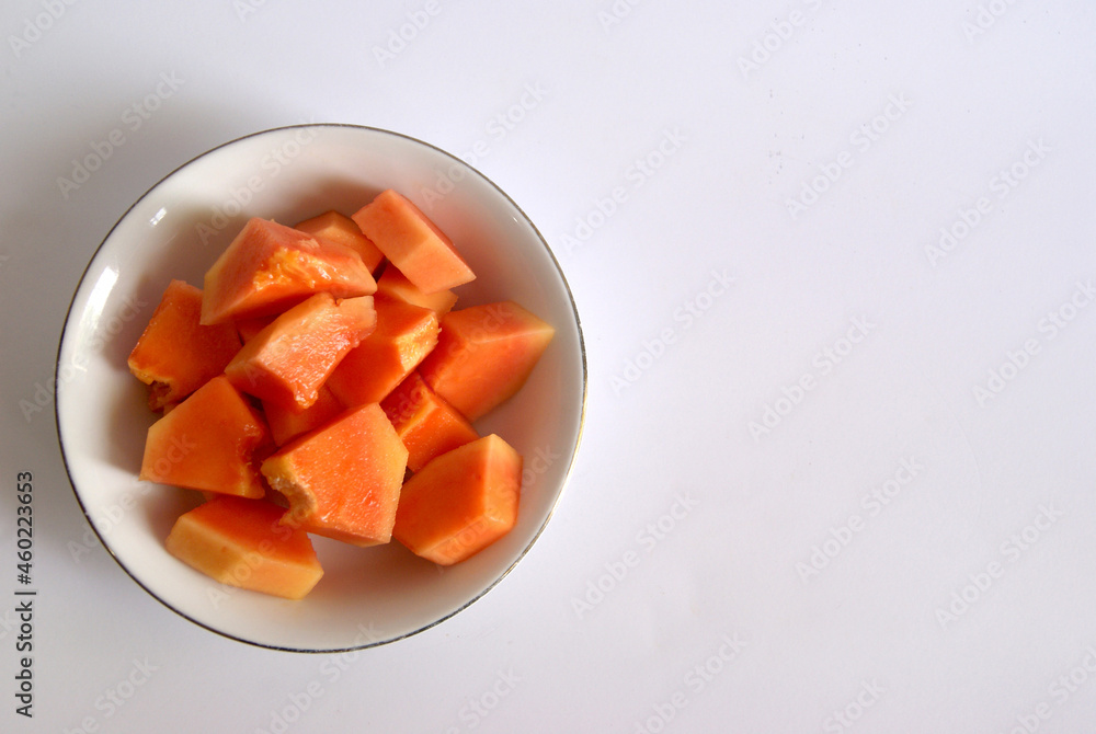 A bowl fresh papaya isolated on white background A bowl fresh papaya isolated on white background