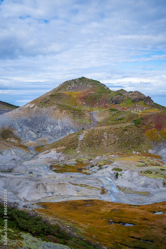 富山県立山町の立山の秋の紅葉の季節に登山している風景 Scenery of climbing Tateyama Mountain in Tateyama Town, Toyama Prefecture, Japan during the season of autumn leaves. 富山県立山町の立山の秋の紅葉の季節に登山している風景 Scenery of climbing Tateyama Mountain in Tateyama Town, Toyama Prefecture, Japan during the season of autumn leaves.