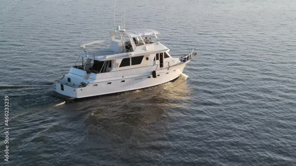 Luxury Yacht Charter Cruising At Inland Estuary Of Lake Pontchartrain. - aerial Luxury Yacht Charter Cruising At Inland Estuary Of Lake Pontchartrain. - aerial