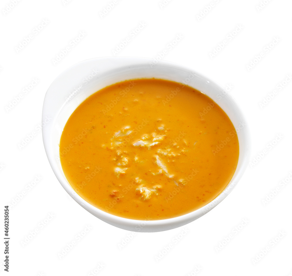 red curry in ceramic cup on white background red curry in ceramic cup on white background