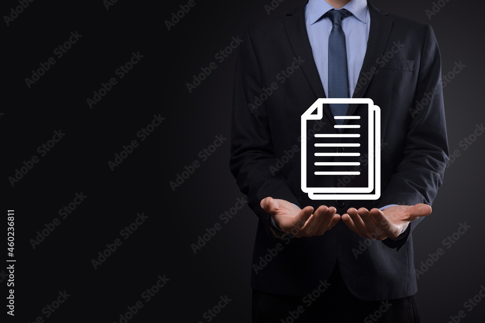 Businessman man holding a document icon in his hand Document Management Data System Business Internet Technology Concept. Corporate data management system DMS Businessman man holding a document icon in his hand Document Management Data System Business Internet Technology Concept. Corporate data management system DMS
