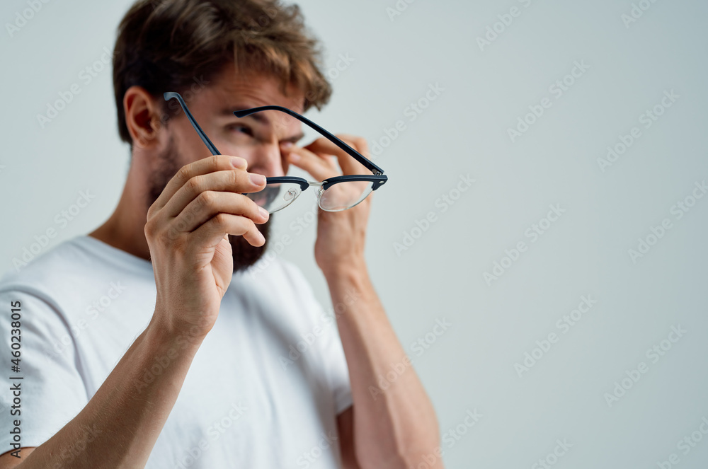 bearded man with poor eyesight health problems close-up bearded man with poor eyesight health problems close-up