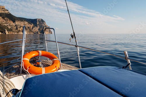 Quadro em tela Lifebuoy saver ring on sailboat in open sea