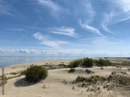 Beautiful dunes with seascape background  perfect surface of the sea