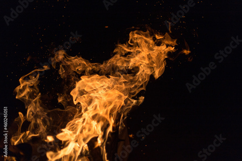 Fire creates endless shapes as it burns, flames and black backgrounds create interesting textures. Flame of Hell. Combustion power.