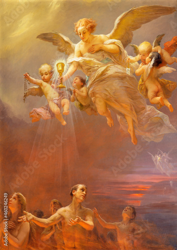Fotografía ROME, ITALY - AUGUST 28, 2021: The painting Angels liberated the souls from the purgatory with Eucharist, rosary and scapular in the church Chiesa San Giacomo in Augusta by E