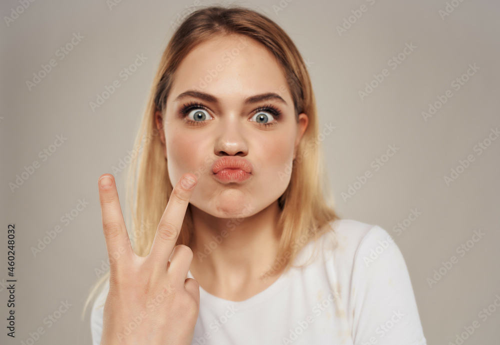 cheerful woman in a white attractive look happy Lifestyle light background cheerful woman in a white attractive look happy Lifestyle light background