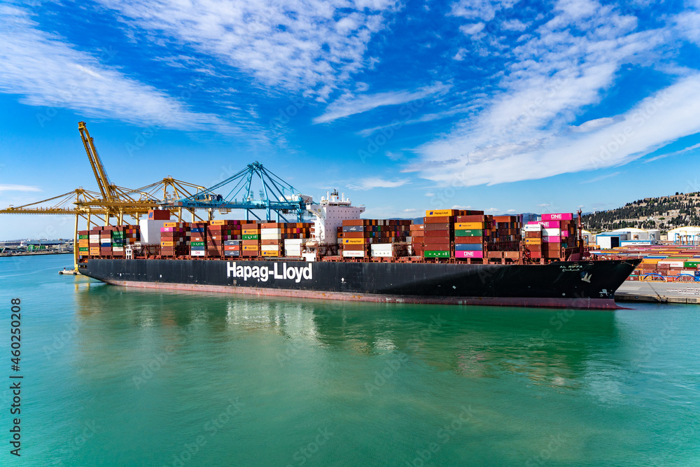 hapag lloyd container cargo ship full of cargo containers at port Stock  Photo | Adobe Stock