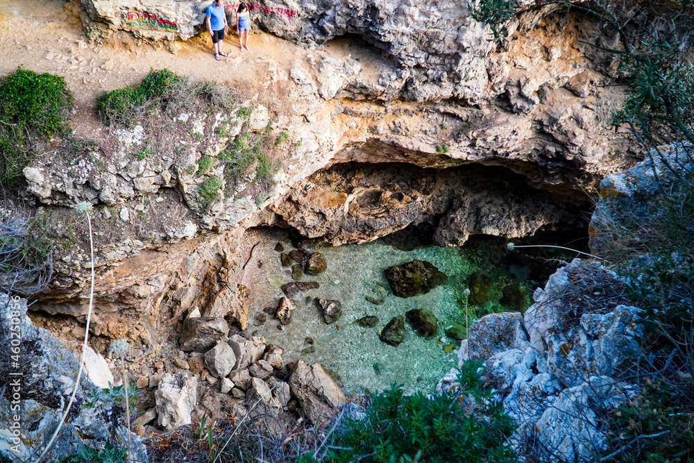 cliffs over the sea , rocky landscape , sea lagoon , sea grotto in the rock cliffs over the sea , rocky landscape , sea lagoon , sea grotto in the rock