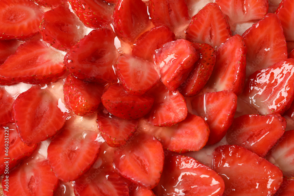 Delicious strawberry tart all over background, close up Delicious strawberry tart all over background, close up