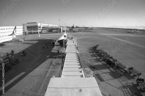 Aitcrafts in Antalya Airport (AYT) Various planes parked on apron. Black and white photo