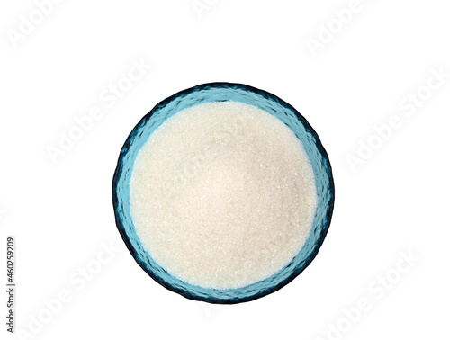 granulated sugar in a blue bowl on a white background