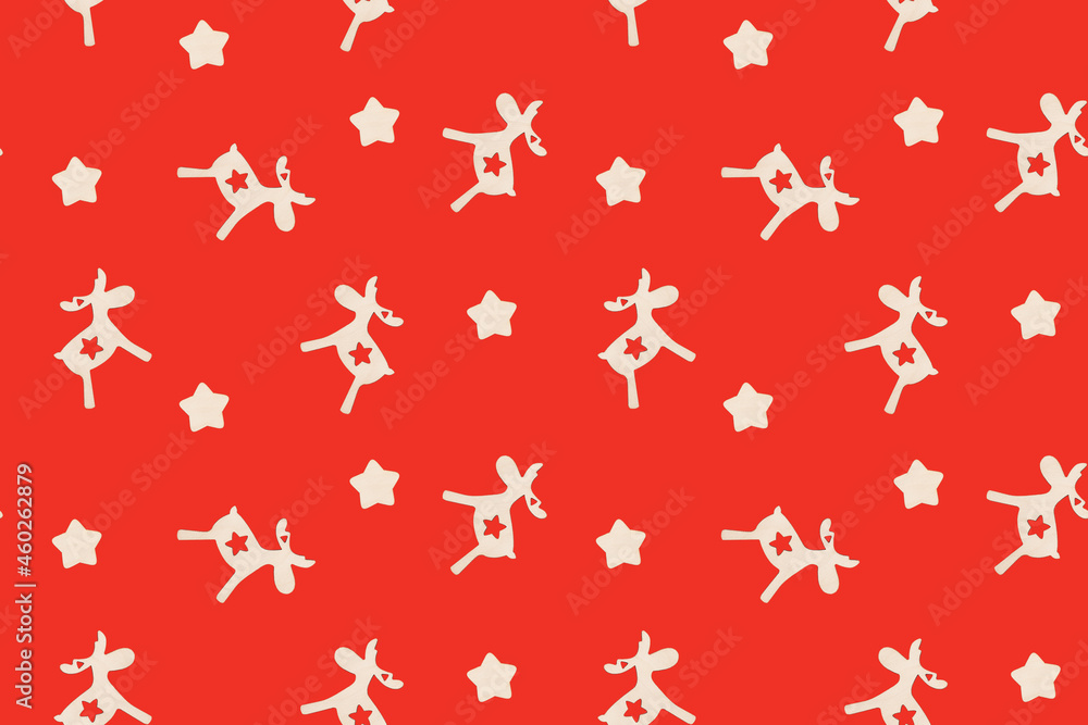 Christmas seamless pattern with deers and stars on red surface