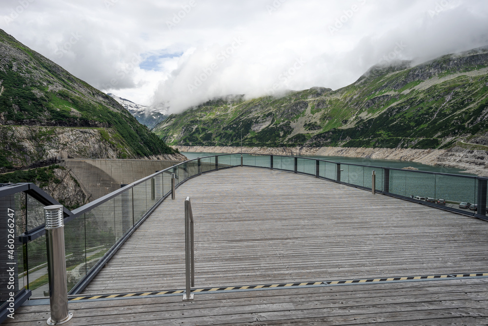 View of the Maltastaudamm and Kölnbreinspeicher from the wooden platform. Austria View of the Maltastaudamm and Kölnbreinspeicher from the wooden platform. Austria