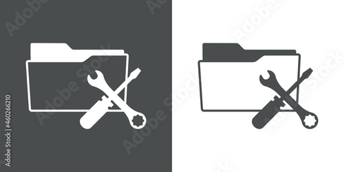 Icono con silueta de carpeta con llave y destornillador en fondo gris y fondo blanco