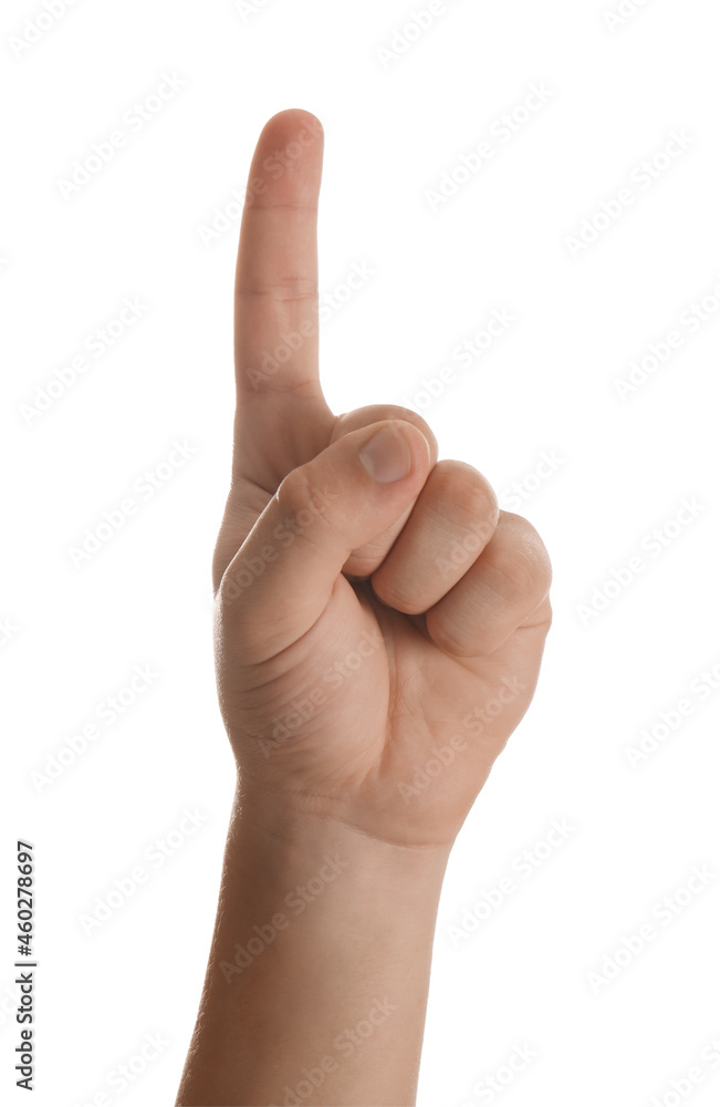 Teenage boy pointing at something on white background, closeup Teenage boy pointing at something on white background, closeup