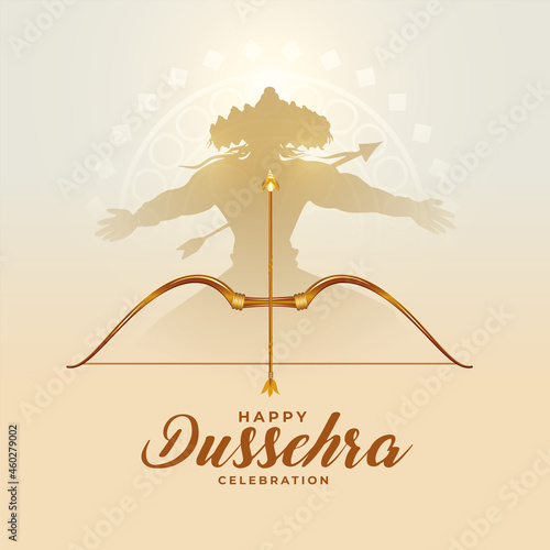 traditional dussehra festival card with ravan and bow arrow