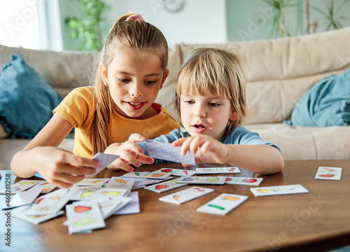 child girl  boy childhood kid brother sister love family together fun happy joy happiness cute play playing board game card