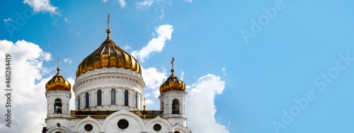 The Cathedral of Christ the Saviour over blue background with clouds, panoramic layout, Moscow, Russia,