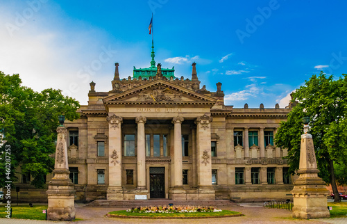 Great panoramic view of the Palais de Justice of Strasbourg before renovation. It is a large 19th-century neo-Greek building in the Tribunal quarter of the Neustadt district of Strasbourg, France. photo