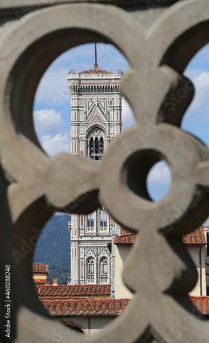 view of Giotto s bell tower from an ancient balustrade in Florence in Italy photo