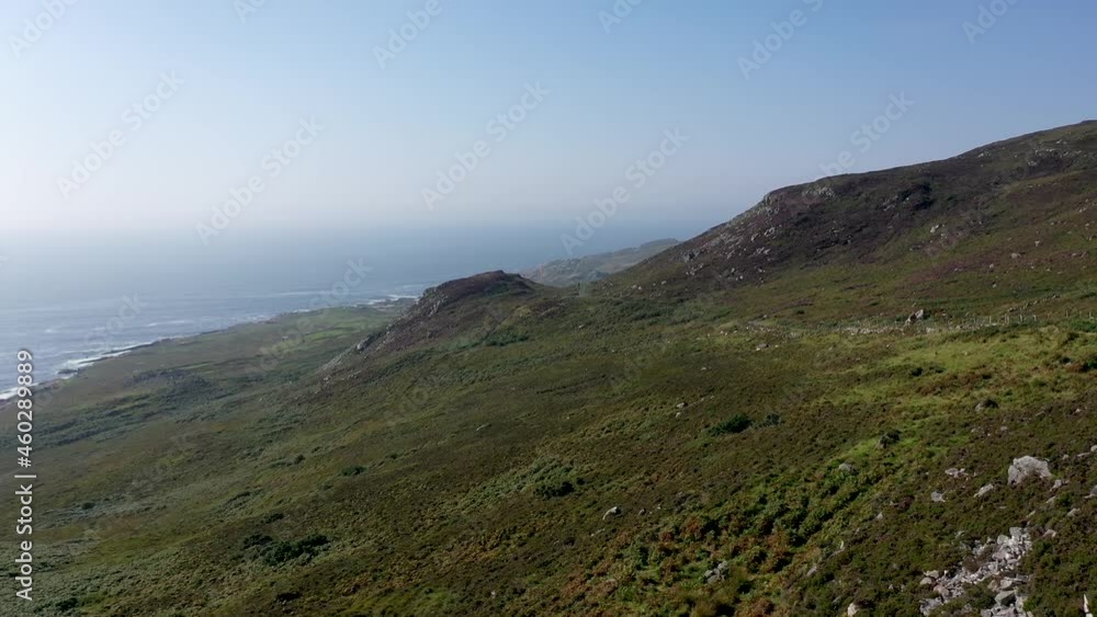 Aerial view of the coastal single track road between Meenacross and Crohy Head south of Dungloe, County Donegal - Ireland Aerial view of the coastal single track road between Meenacross and Crohy Head south of Dungloe, County Donegal - Ireland